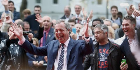 Nigel Farage, leader of the U.K. Independence Party (UKIP), cheers with the crowd as he arrives for the premiere of "Brexit: The Movie" in London, U.K., on Wednesday, May 11, 2016. While online polls suggest the contest for the June 23 referendum is too close to call, less frequent telephone polling has put the "Remain" camp ahead. Photographer: Chris Ratcliffe/Bloomberg via Getty Images