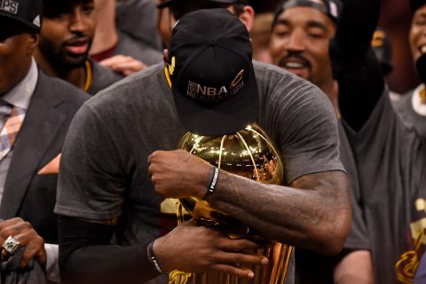 Cleveland Cavaliers' LeBron James (23) hugs the Larry O'Brien trophy after defeating the Golden State Warriors in Game 7 of the NBA Finals at Oracle Arena in Oakland, Calif., on Sunday, June 19, 2016. The Cleveland Cavaliers defeated the Golden State Warriors 93-89 to win the NBA championship. (Jose Carlos Fajardo/Bay Area News Group)